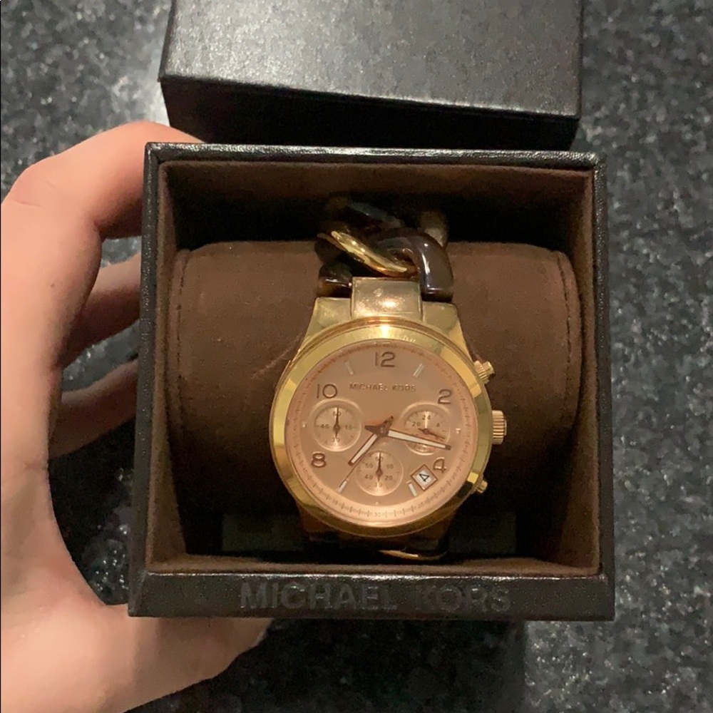 Michael Kors tortuous rose gold watch